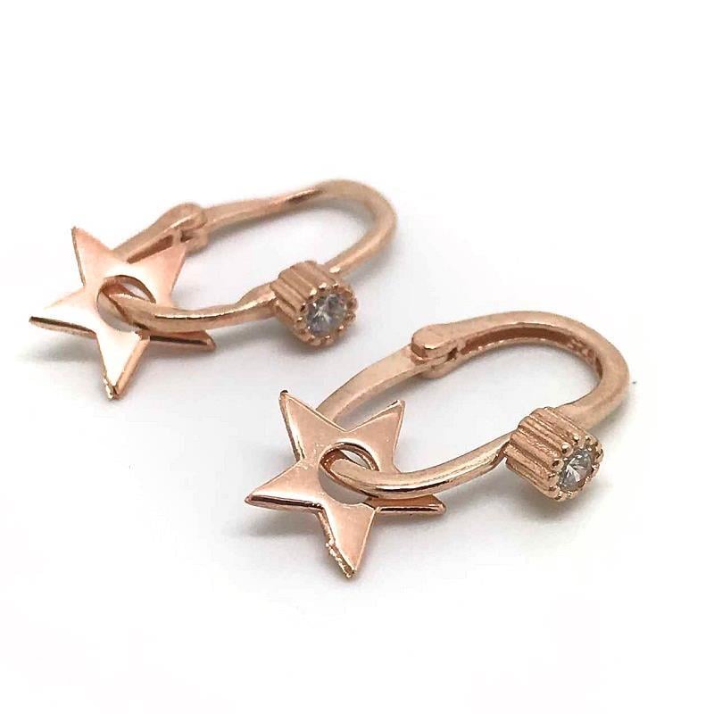 Gümüş fırfırlı göçmen küpesi nz74r1