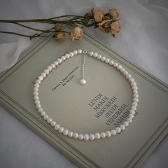 Gümüş kilitli 6-7mm doğal inci kolye