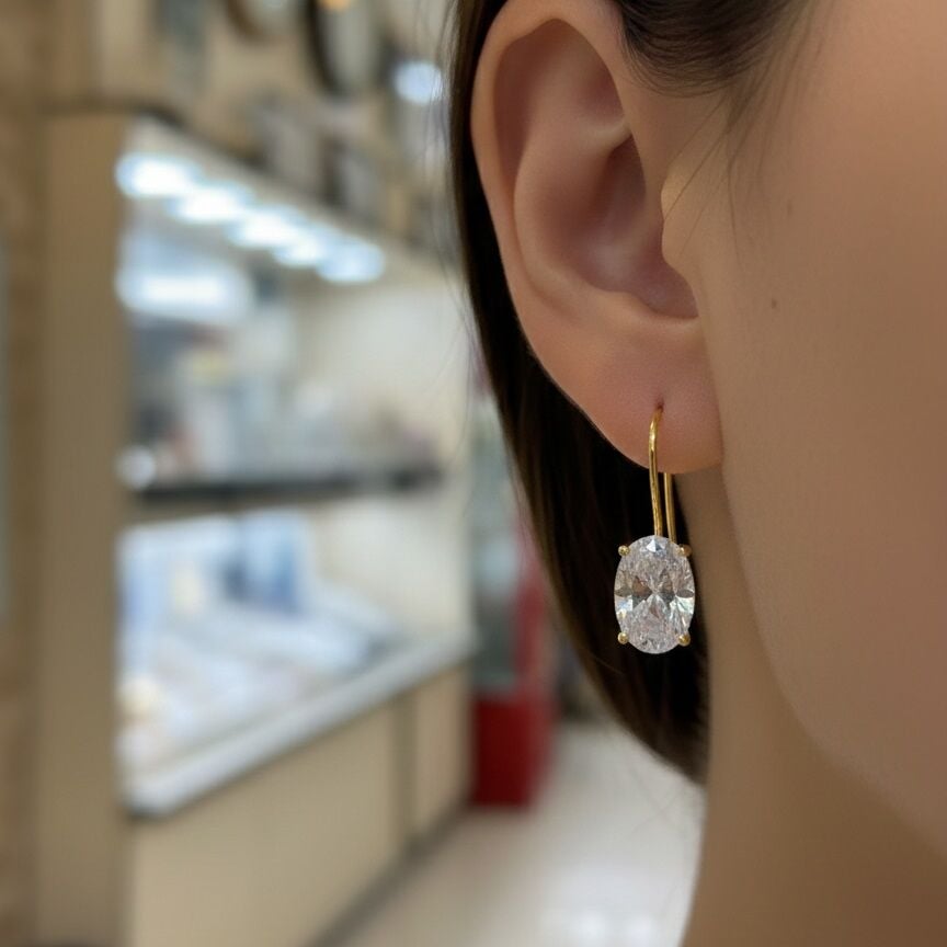 Gümüş oval 12x8 mm 4,5 carat sallantılı altın kaplama tektaş küpe